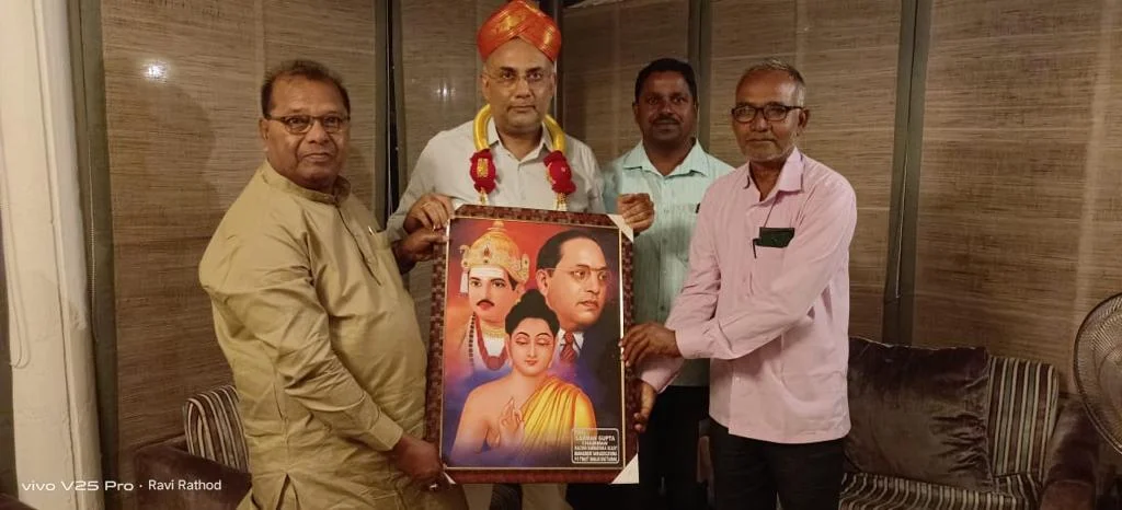 Shri Dinesh Gunderao Minister Of Health and Family Welfare Govt. Of Karnataka being felicitated by Shri L G Gupta President PE Society Bhalki at his Office in the Vidhan Soudha along with Satish Ganpati and Chandrappa Karkalle.